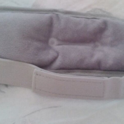Grey gel mask with velour lining and adhesive closure, like new