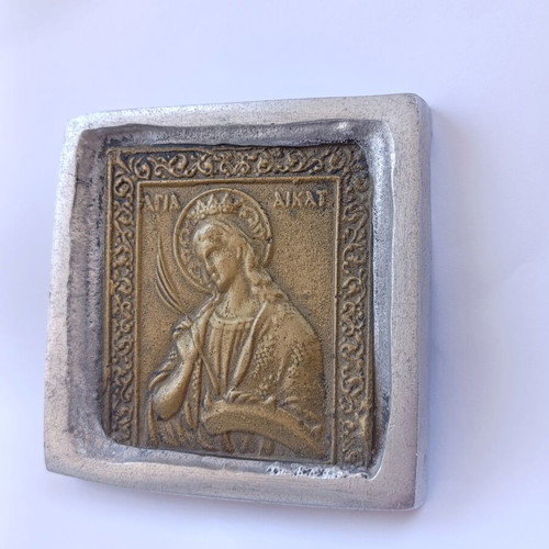 Metal press paperweight icon, vintage