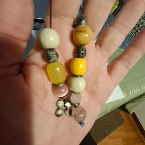 Worry beads used with colorful beads, evil eye and metal element