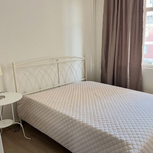 Double iron bed 176x200 with Guy Laroche mattress and wooden nightstand, like new
