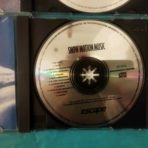 Escape Hot City Hits and Snow Motion Music CDs like new