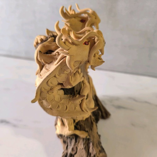 Wooden carved dragons used on wooden base