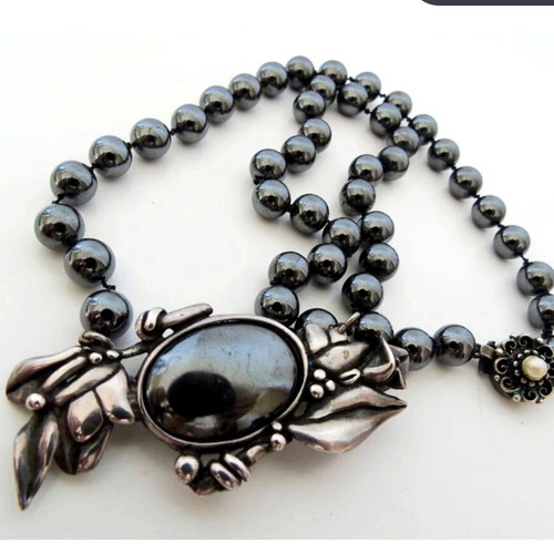 Vintage necklace with hematite beads and motif-pin used, gray