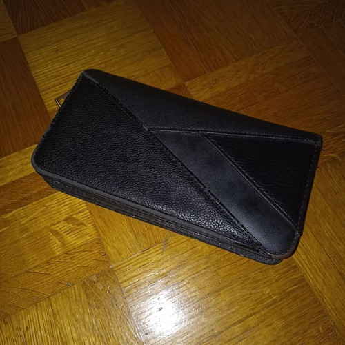 Black wallet slightly used with multiple compartments