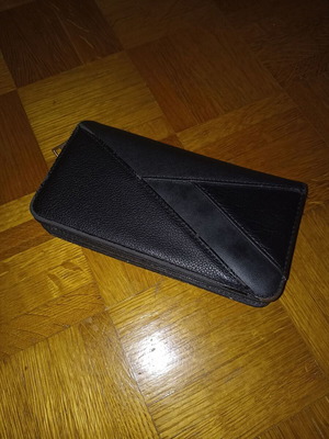 Black wallet slightly used with multiple compartments