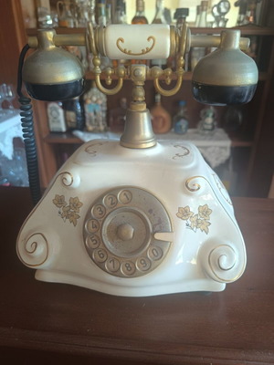 Porcelain antique telephone decorative, used
