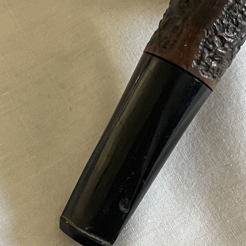 Handmade Czech wooden smoking pipe used with signs of wear