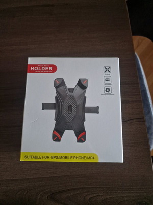 Phone holder new, in box