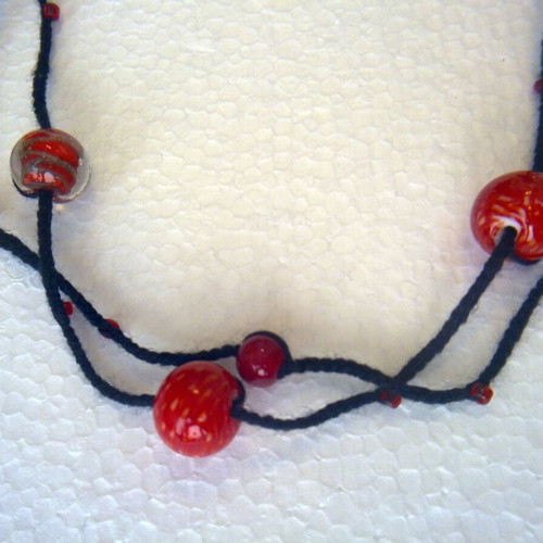 Double necklace 38cm with red glass beads on black cord