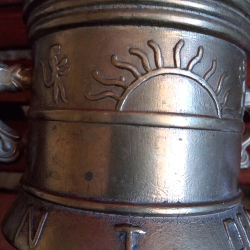 Copper mortar used with embossed decorations