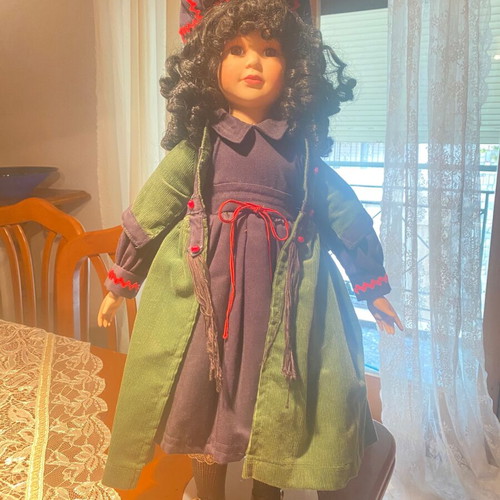 Porcelain doll like new from collection