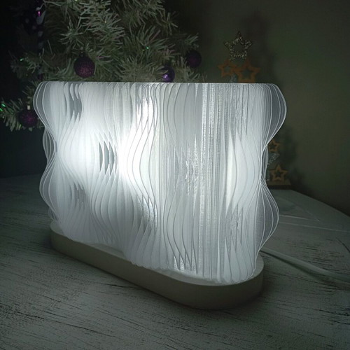 Modern design table lamp new, sculptural with wavy texture