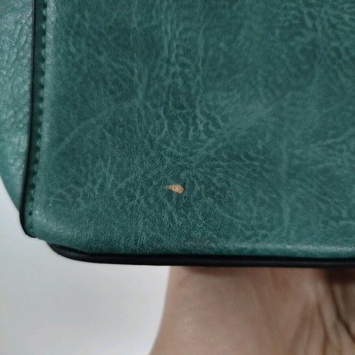 Turquoise shoulder bag with three compartments used