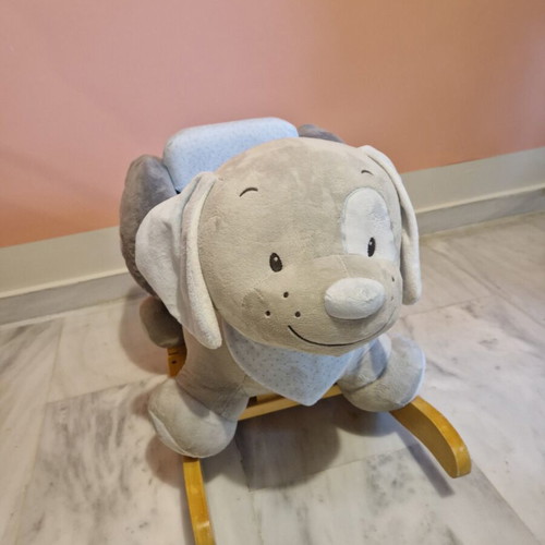 Rocking dog plush toy like new