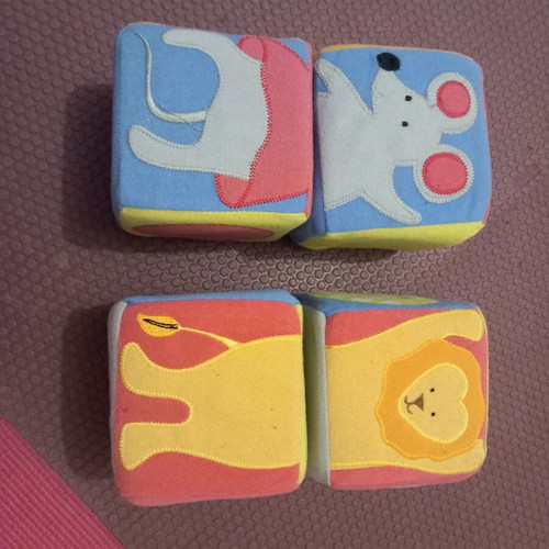 Soft plush blocks used, 4 plush cubes with designs