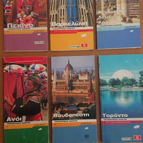 Lonely Planet travel guide issues like new, 56 pieces