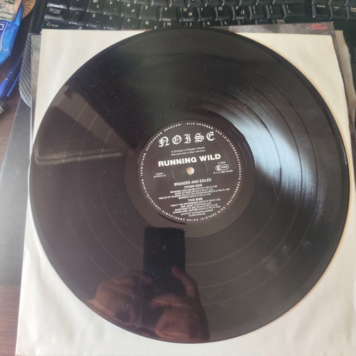 Running Wild Branded and Exiled LP first press 1985 like new, metal