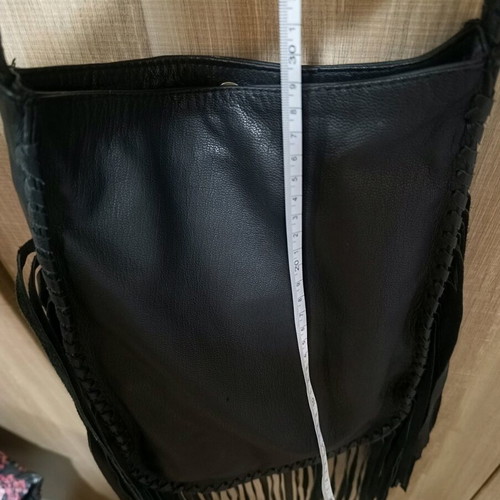 Women's leather crossbody bag with fringes nearly unused black