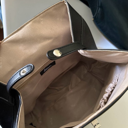 KEM black backpack bag like new with minor scratches on clasp