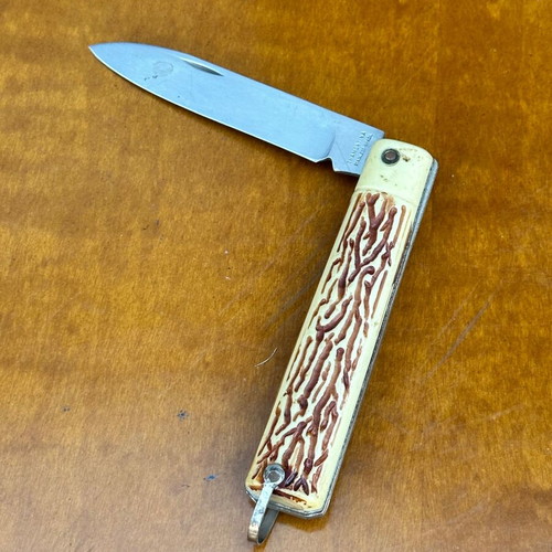 Vintage Tramontina folding knife from Brazil, used, decorative handle