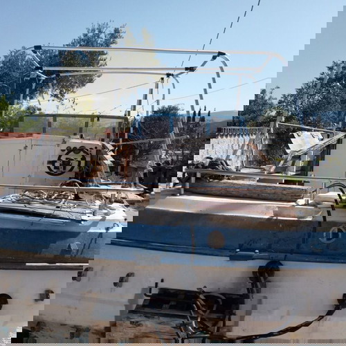 Σκάφος καμπινάτο πολυεστερικό 5.8 μεταχειρισμένο με τρέιλερ