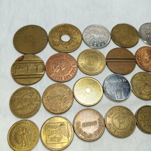 Tokens used, 30 old foreign brands for parking and car wash
