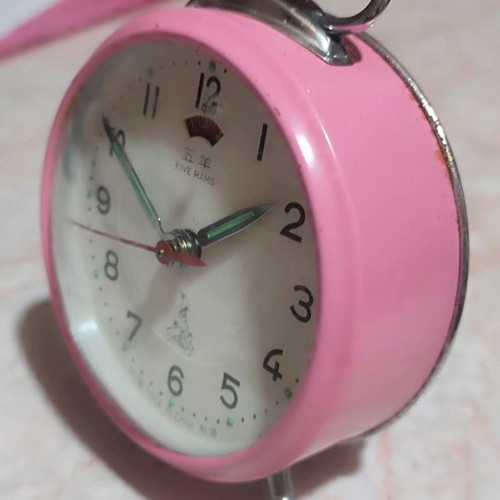 Five Rams table clock used, wind-up, pink