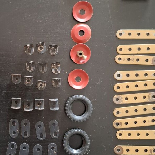 Metal construction toy used with wear