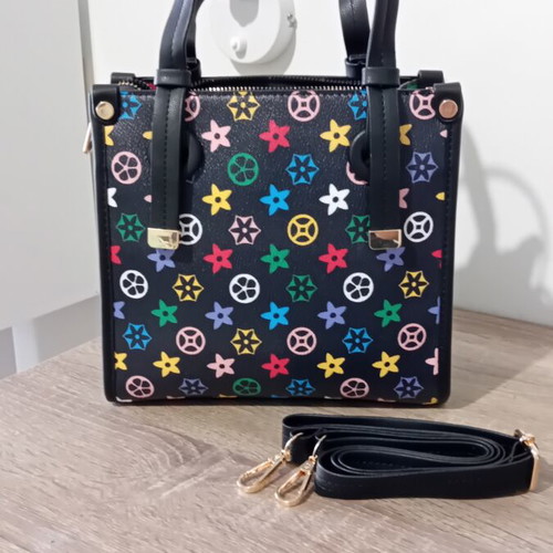 A To Z Greek Mini Handbag like new with colorful geometric patterns