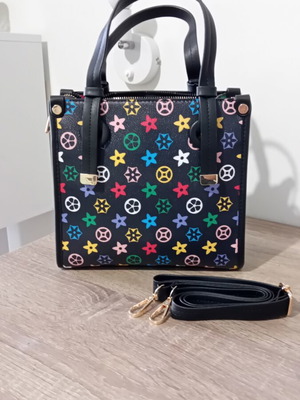 A To Z Greek Mini Handbag like new with colorful geometric patterns