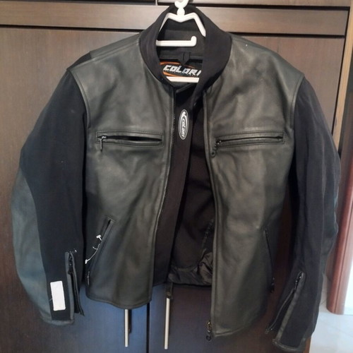 Colori women's motorcycle jacket like new, size small with shoulder protection