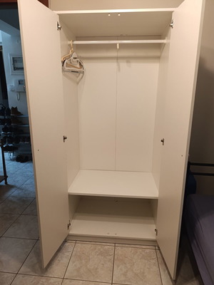Kleppstad wardrobe like new, spacious white storage closet