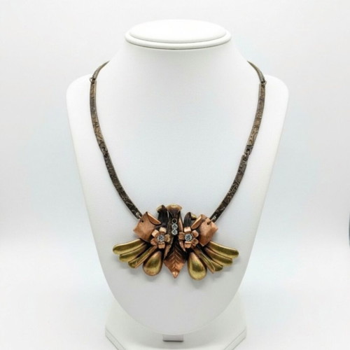 Vintage necklace with decorative leaf and flower elements, like new