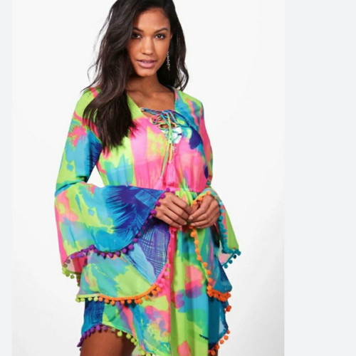 pom pom beach dress The perfect white beach dress Made of feather light fabric that flutters on the breeze & the cutest little pom pom trim I dressed it up with a rattan belt,