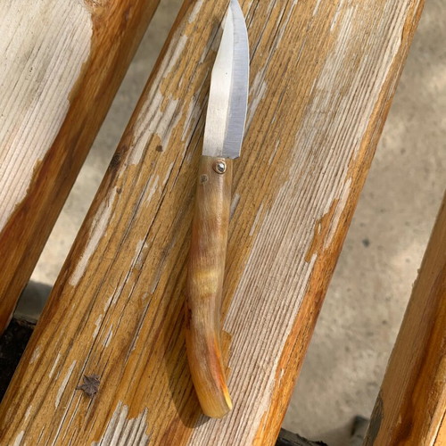 Handmade small folding knife used without blade lock