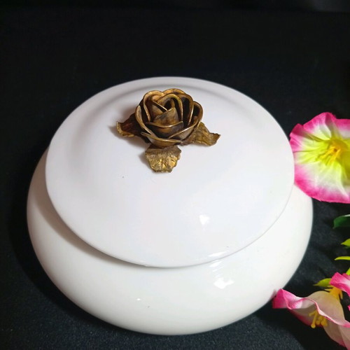 Vintage porcelain box with metal rose lid