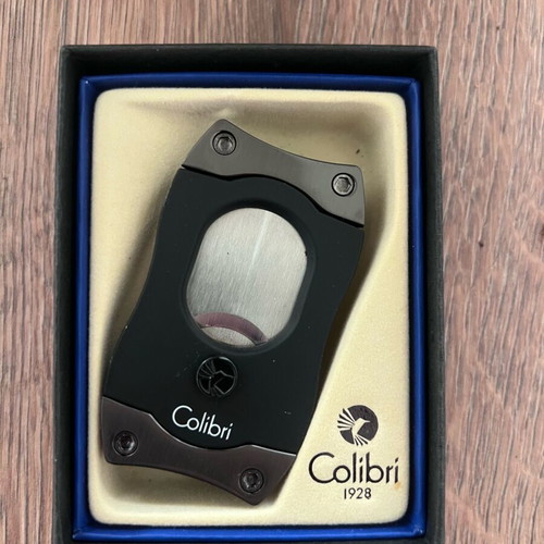 Cigar accessories like new with cedar humidifier, Colibri cutter and Xikar hygrometer
