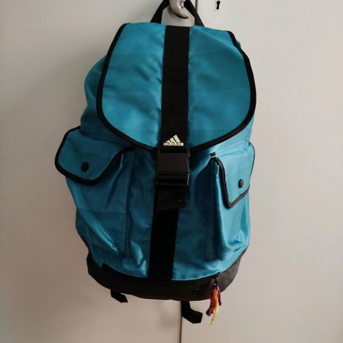 Adidas backpack used, turquoise waterproof with 2 outer pockets
