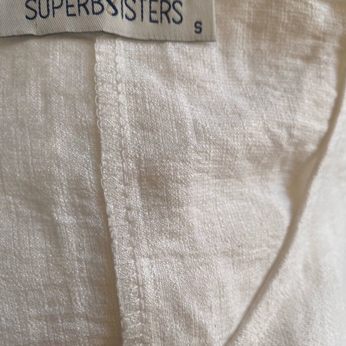 White linen one-piece with belt and straw buckle, new