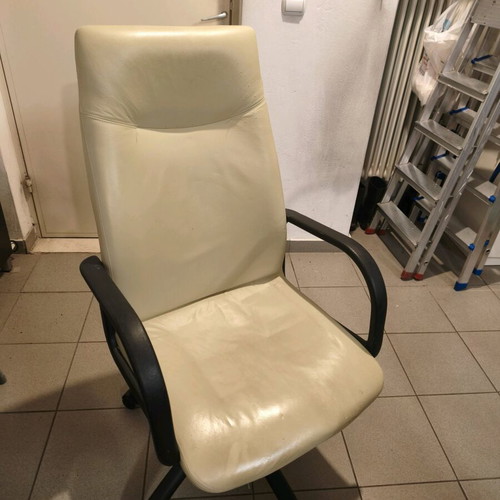 Office chair used with ergonomic position and height adjustment