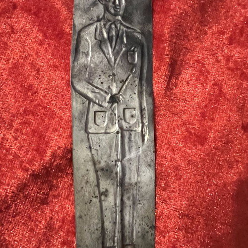 Silver votive in very bad condition