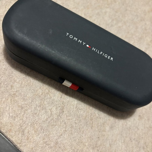 Tommy Hilfiger sunglasses with gold frame and dark lenses