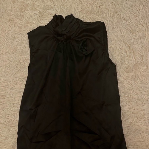 Black satin blouse with 3-D rose design like new