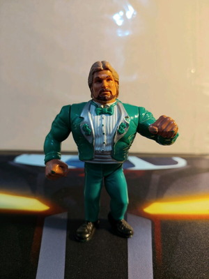 Ted DiBiase WWF Series 2 figure like new with Million Dollar Punch mechanism