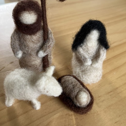 Woolen nativity scene with Mary, Joseph, baby Jesus and lamb