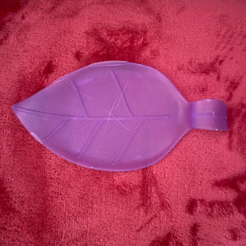 Spoon holder used, plastic, purple color, leaf design