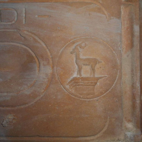 Ceramic roof tile used with ''Laterizi di Rodi'' mark and deer