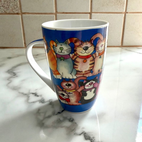 Large porcelain mug with cat design like new