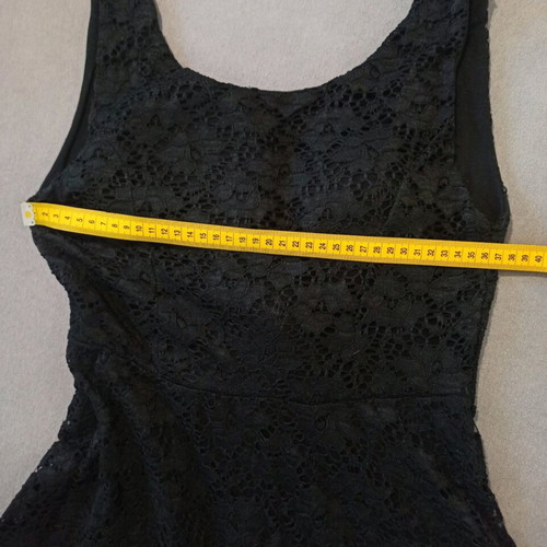 Black dress like new, one size with lace and open back