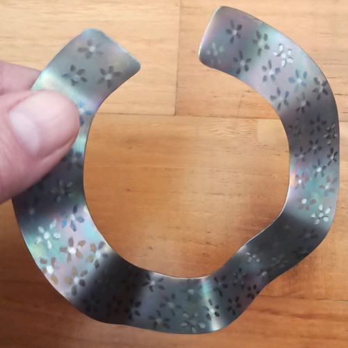 Titanium bracelet with iridescence and flowers like new